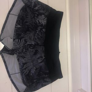 Two pair of patterned Lululemon shorts